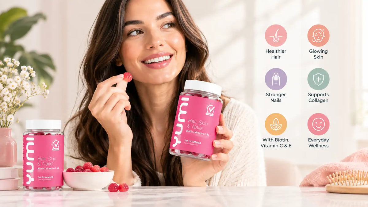 Woman holding women's multivitamin gummies