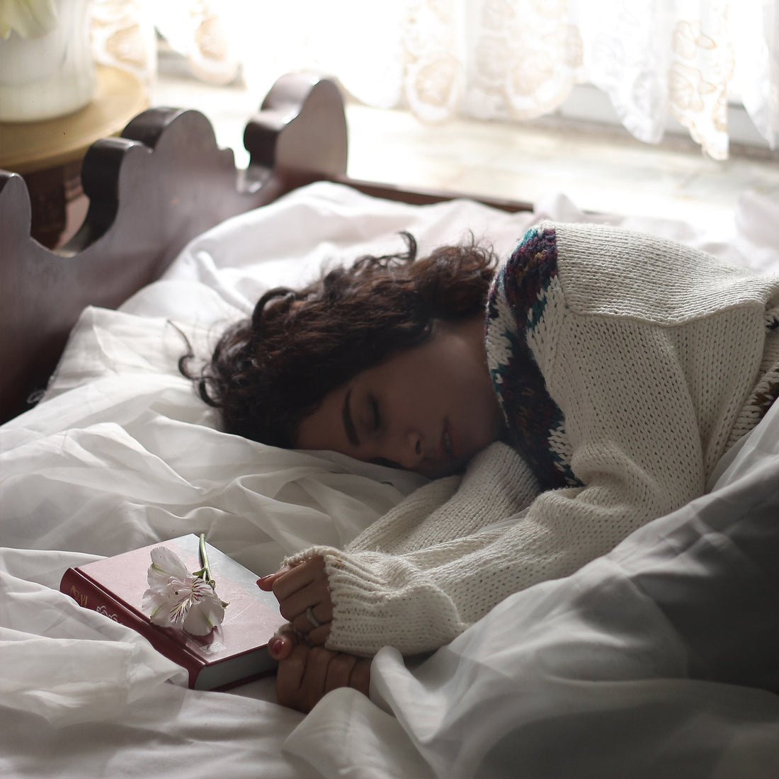 Person sleeping peacefully in bed at night  3.