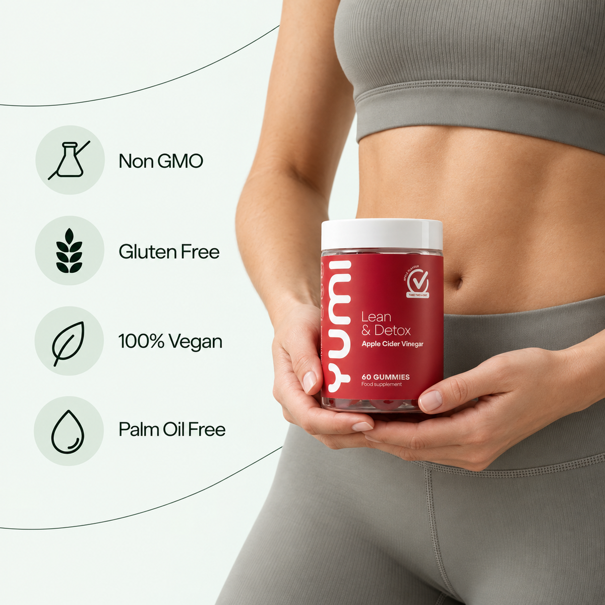 Woman holding Yumi Lean & Detox gummies bottle with Non-GMO, Gluten Free, 100% Vegan, and Palm Oil Free icons
