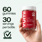 Hand holding Yumi Lean & Detox gummies bottle with text highlighting 60 gummies and 30 servings per bottle