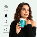 Woman in black top holding Yumi Ashwagandha gummies bottle with Non GMO, Gluten Free, 100% Vegan, and Palm Oil Free icons