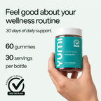Hand holding Yumi Wellness Ashwagandha gummies bottle showing 60 gummies and 30 servings per bottle